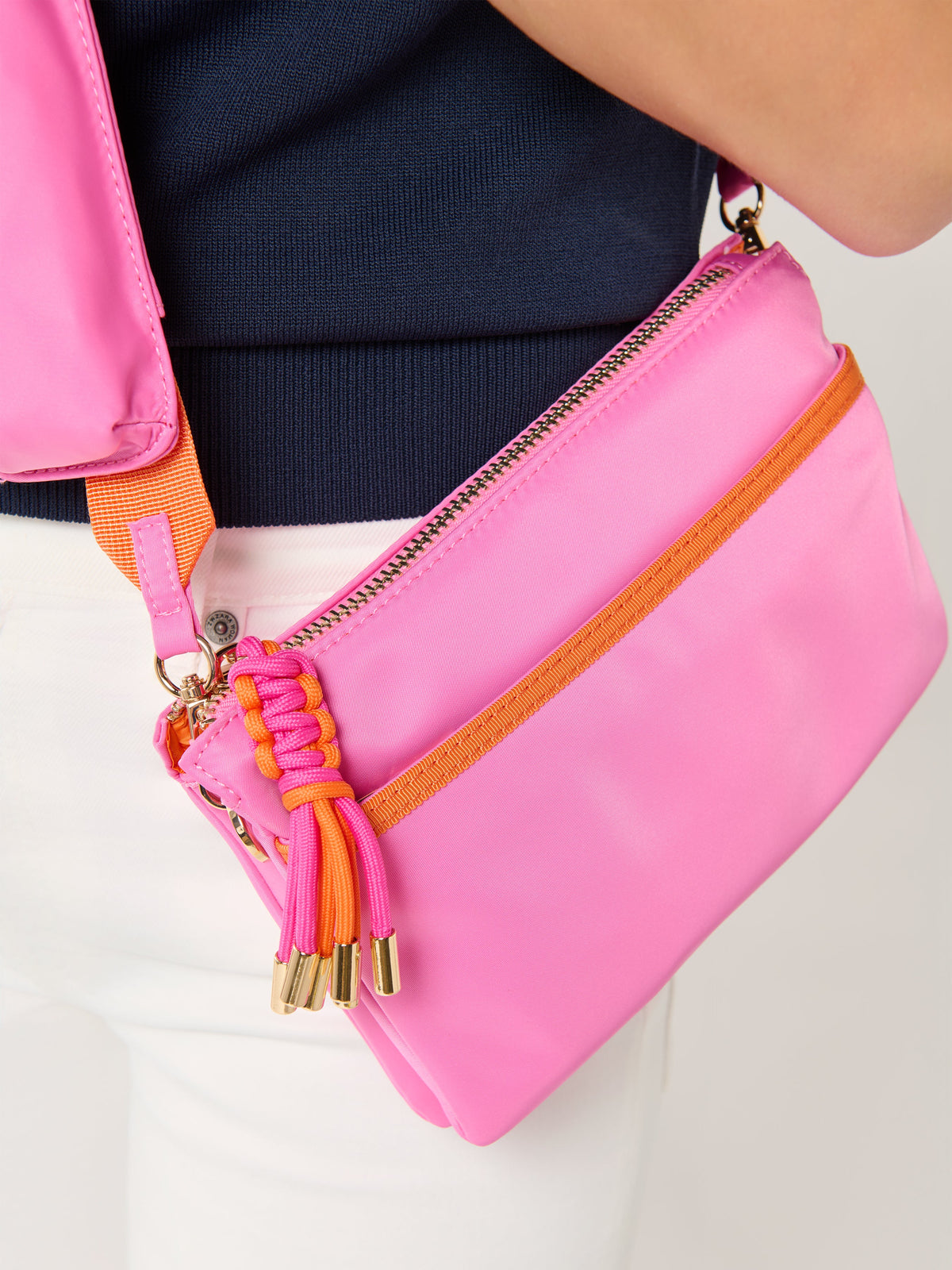Jet Cross-Body Bag with Eyeglasses Pouch, shown in a styled setting