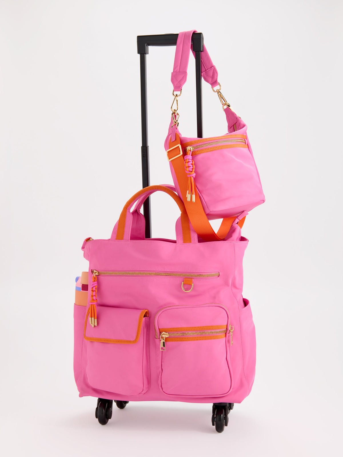 Jet 360 Roller Tote with Spinner Wheels, shown in a styled setting