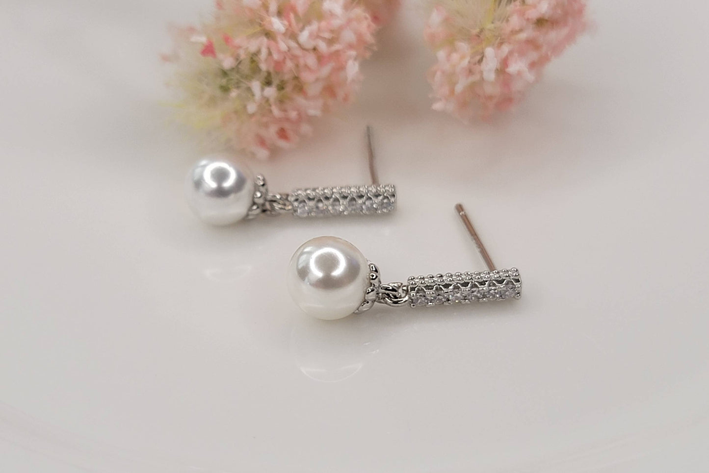 SINGLE PEARL DROP WITH CZ DANGLE EARRINGS.
