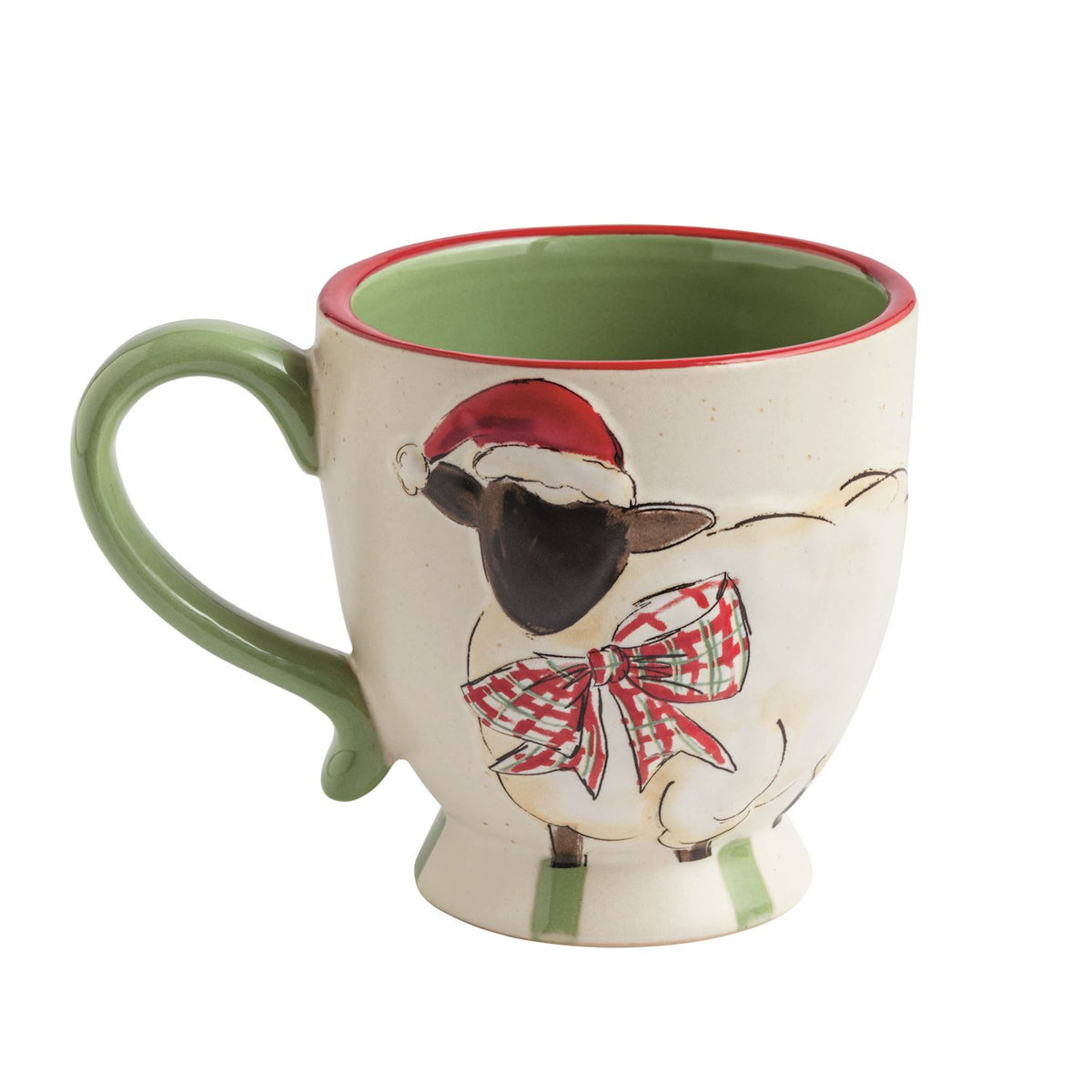 Santa Hat Sheep Farmhouse Christmas Mug, Cream speckled stoneware mug with a raised painted sheep in a red Santa hat and plaid bow, a green handle, green interior with a red rim line, and a green striped pedestal foot.