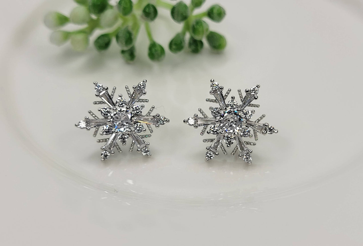 SNOWFLAKE POST EARRINGS.
