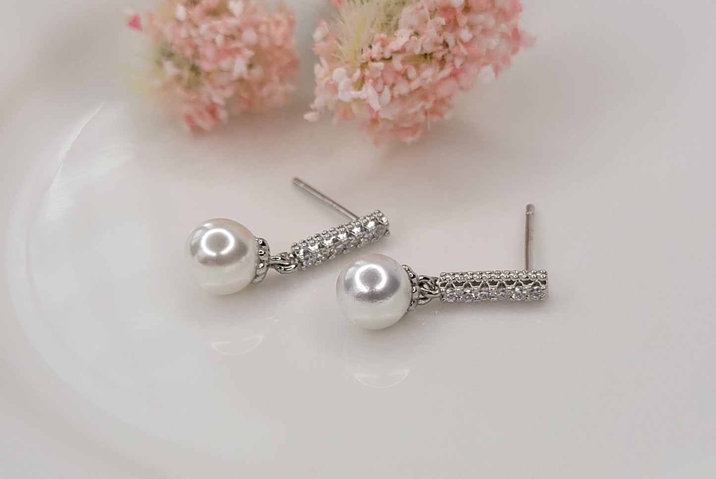 SINGLE PEARL DROP WITH CZ DANGLE EARRINGS.