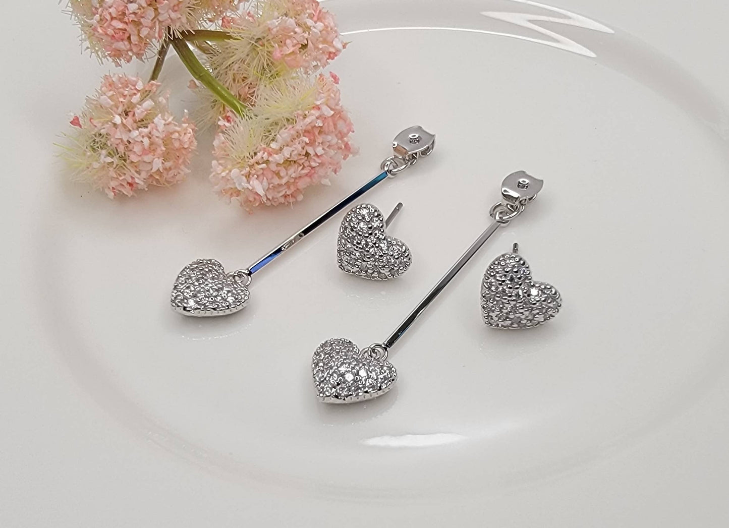 DOUBLE HEART BACK DROP EARRINGS.