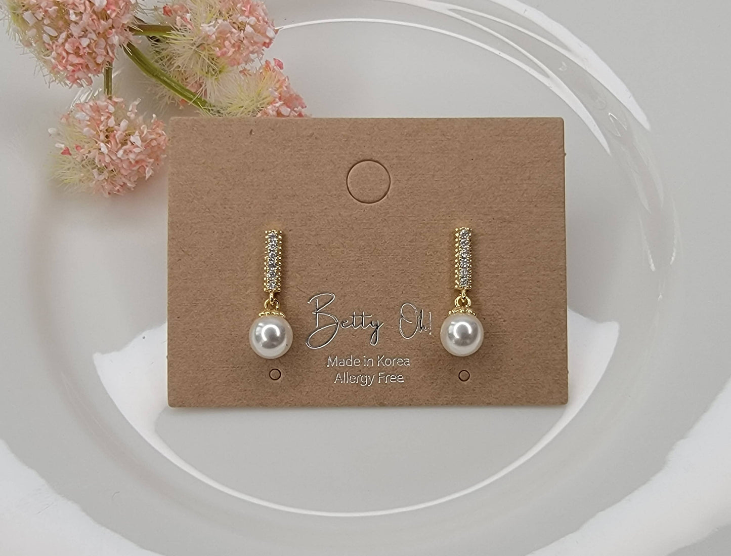 SINGLE PEARL DROP WITH CZ DANGLE EARRINGS.