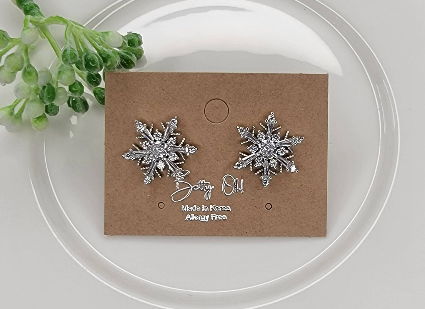 SNOWFLAKE POST EARRINGS.