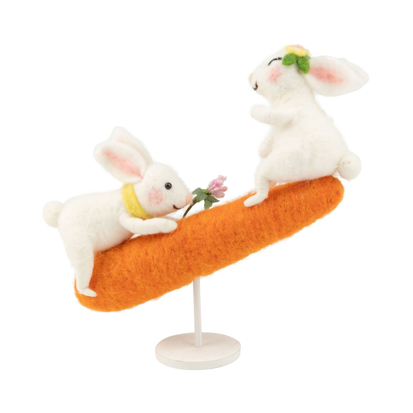 Felt bunnies on carrot teeter totter TP, wood base
