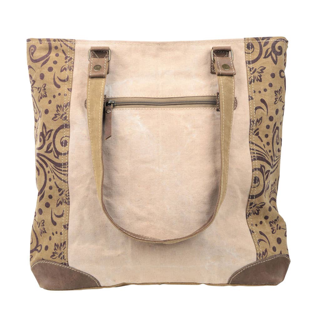 Bolso tote de lona vintage con flores y bolsillo delantero grande.