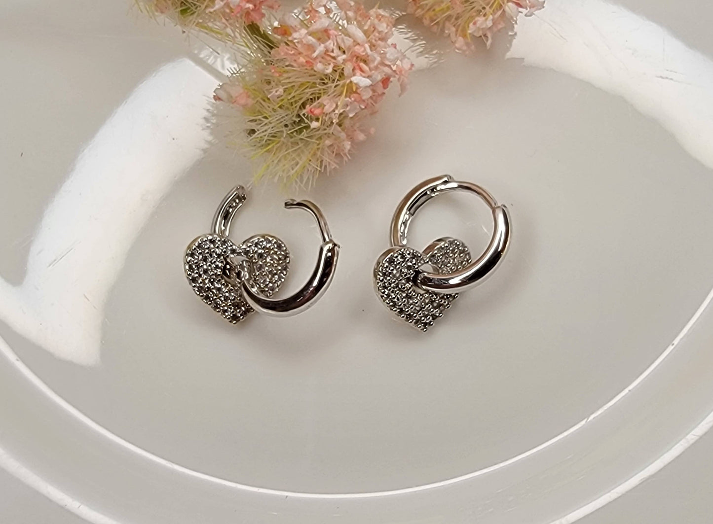 CZ HEART CHARM CLICKER EARRINGS.