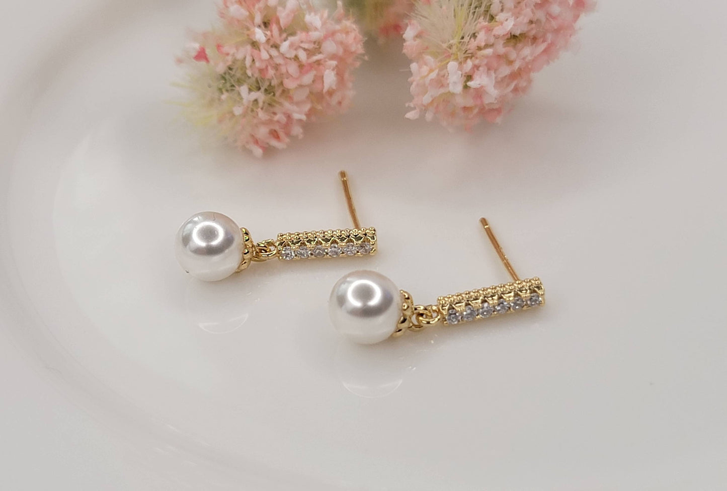 SINGLE PEARL DROP WITH CZ DANGLE EARRINGS.
