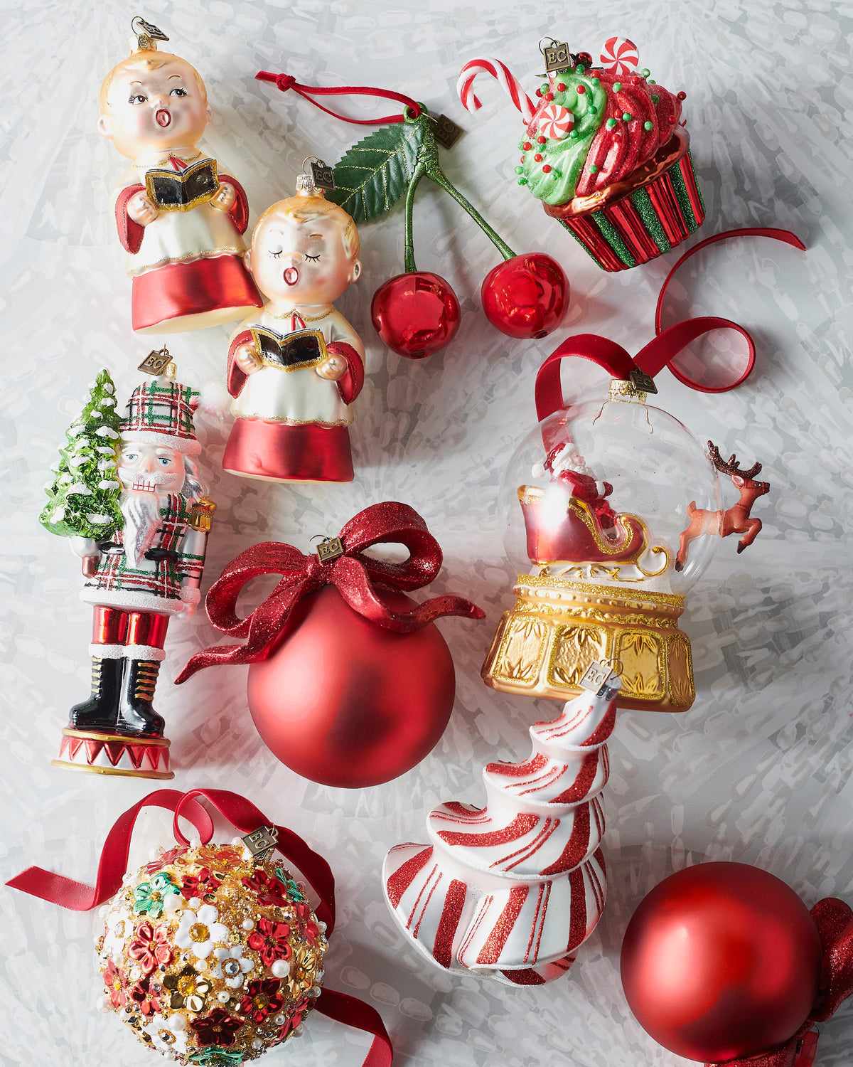 Candy Cane Spiral Tree Ornament, A white glass spiral tree ornament with red glitter stripes resembling a candy cane.