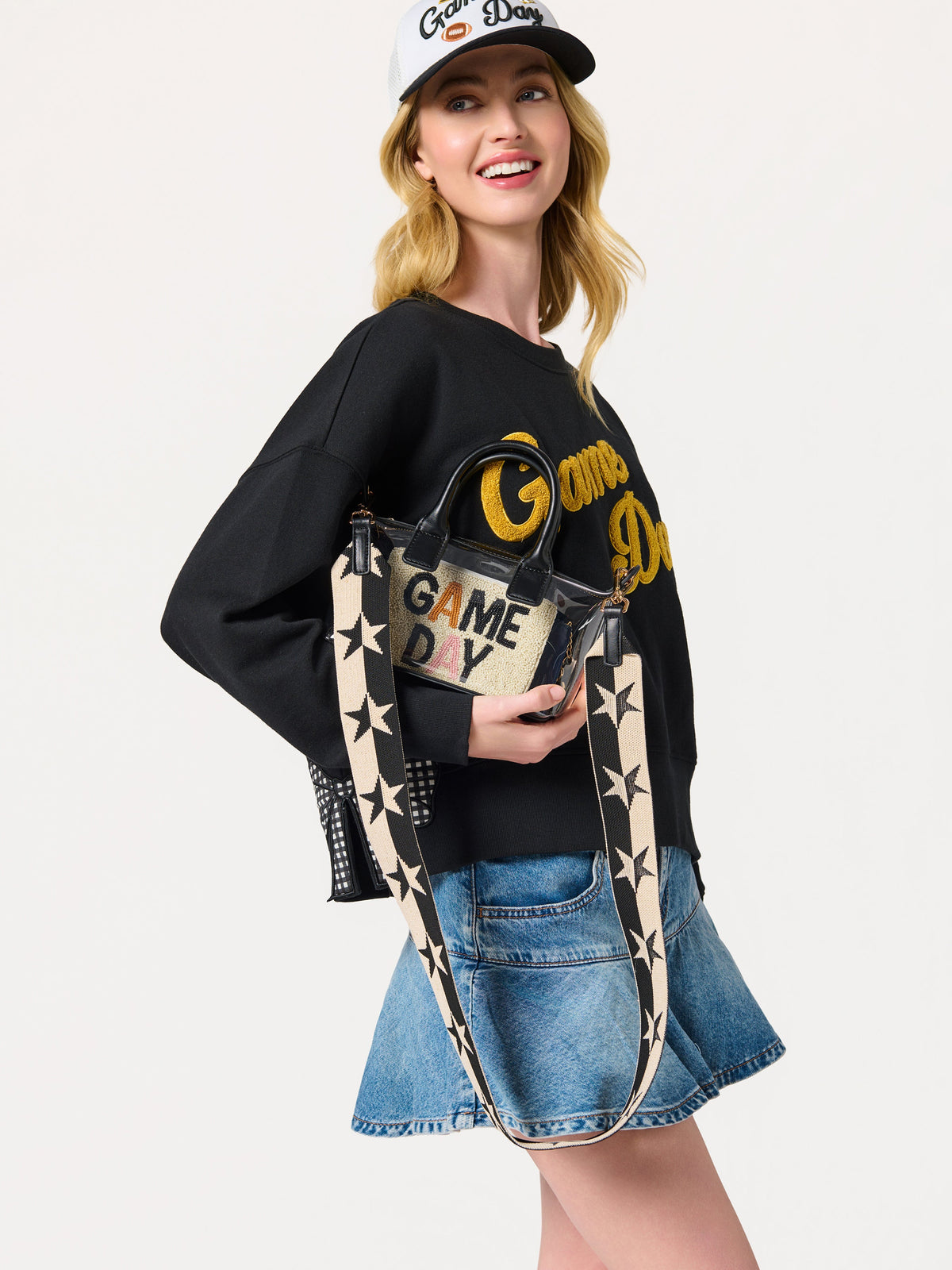 Spectator Clear Stadium Top Handle Cross-Body Bag, Black, shown in a styled setting