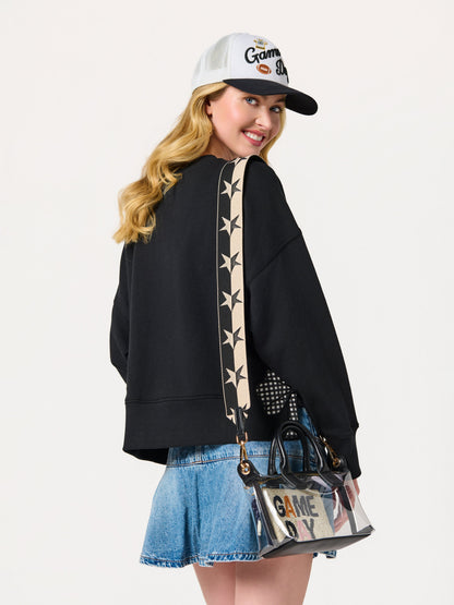Spectator Clear Stadium Top Handle Cross-Body Bag, Black, shown in a styled setting