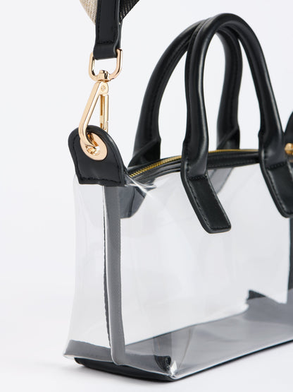 Spectator Clear Stadium Top Handle Cross-Body Bag, Black, shown in a styled setting