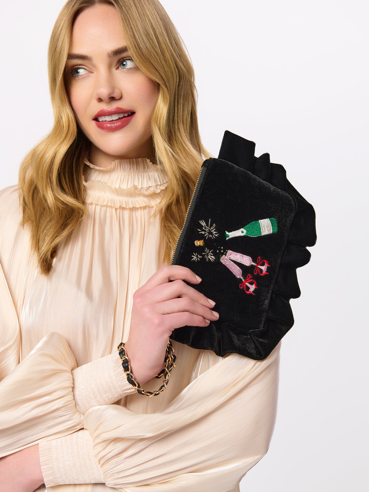 Pop Velvet Wristlet with Champagne Embroidery, Black, shown in a styled setting