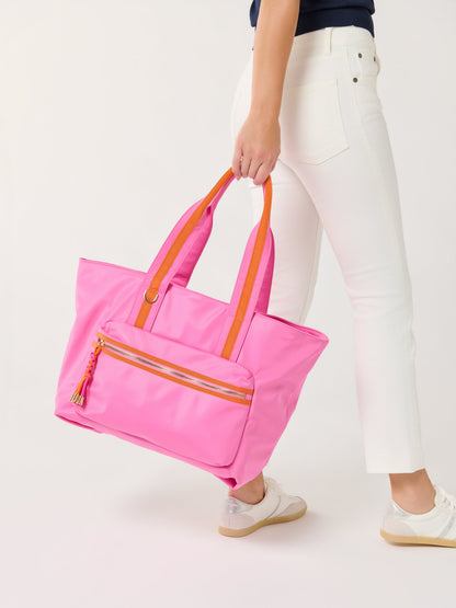 Jet Tote with Trolley Sleeve and Zip Pockets, shown in a styled setting