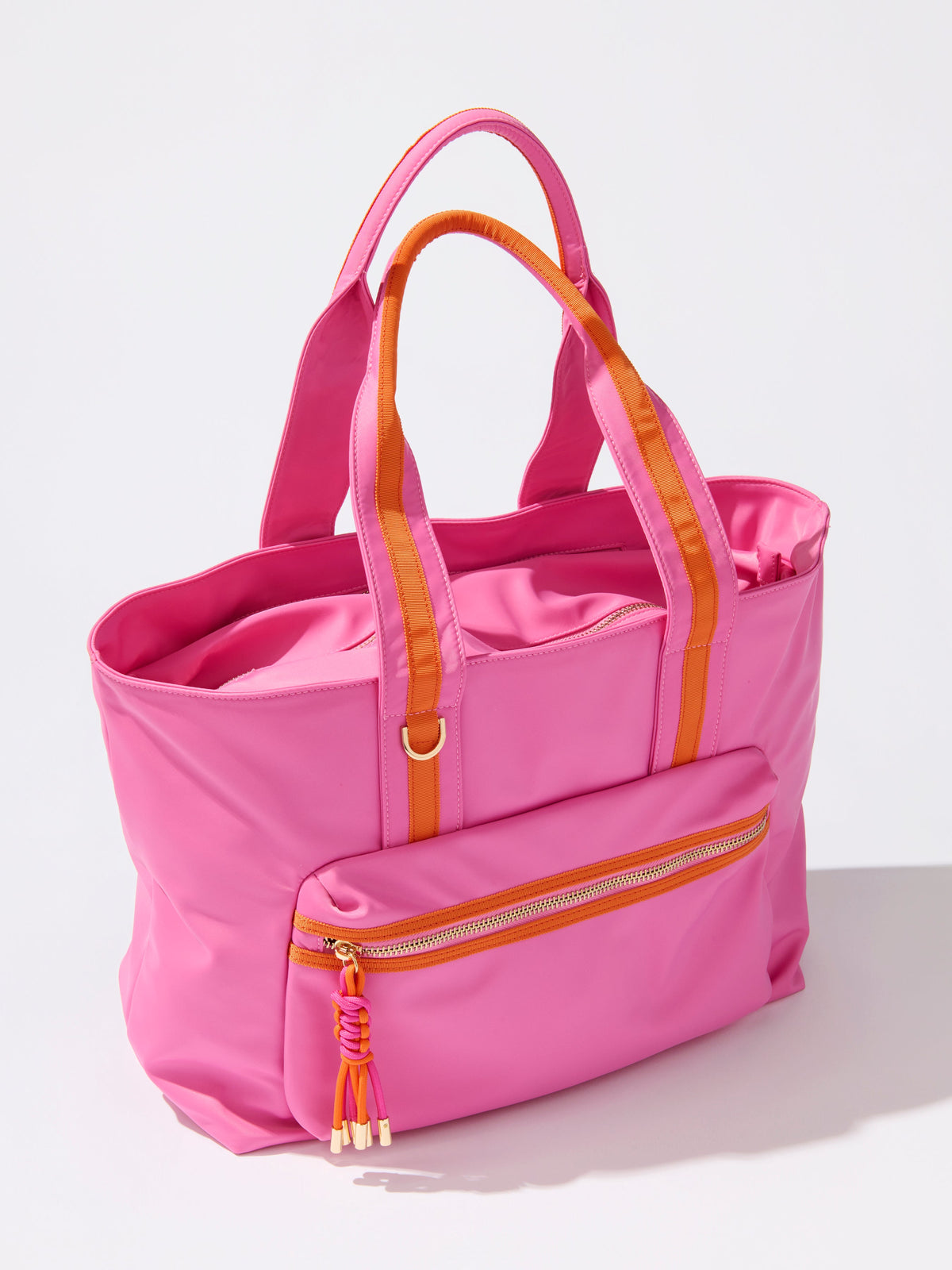 Jet Tote with Trolley Sleeve and Zip Pockets, shown in a styled setting