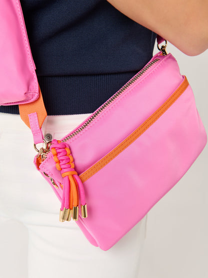 Jet Cross-Body Bag with Eyeglasses Pouch, shown in a styled setting