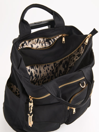 Jet 360 Roller Tote with Spinner Wheels, shown in a styled setting