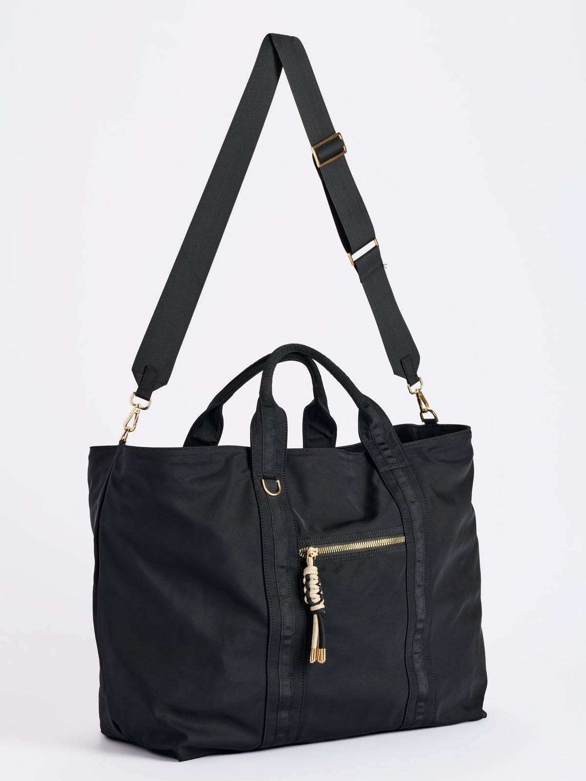 Jet Travel Tote with Cross-Body Strap, shown in a styled setting