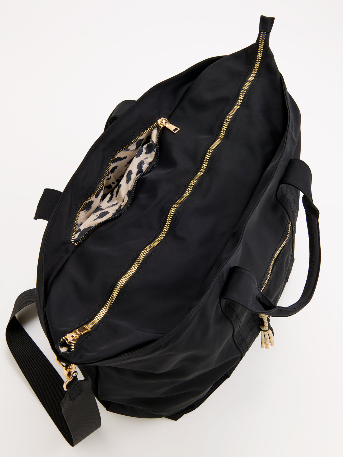 Jet Travel Tote with Cross-Body Strap, shown in a styled setting