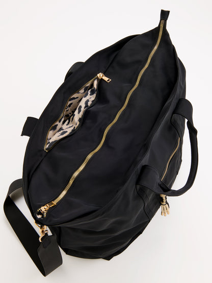 Jet Travel Tote with Cross-Body Strap, shown in a styled setting