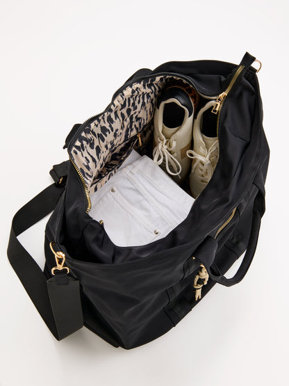 Jet Travel Tote with Cross-Body Strap, shown in a styled setting