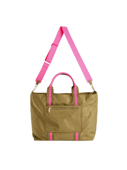 Jet Travel Tote with Cross-Body Strap, A black tote with two top handles, a long black cross-body strap, a front zip pocket and a cream knotted tassel on the zipper pull.