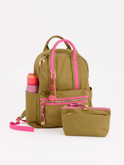 Jet Backpack with Inner Tech Sleeve, A navy backpack with bright green handles and zipper trim, a front zip pocket, side pockets and a green and navy tassel zipper pull.