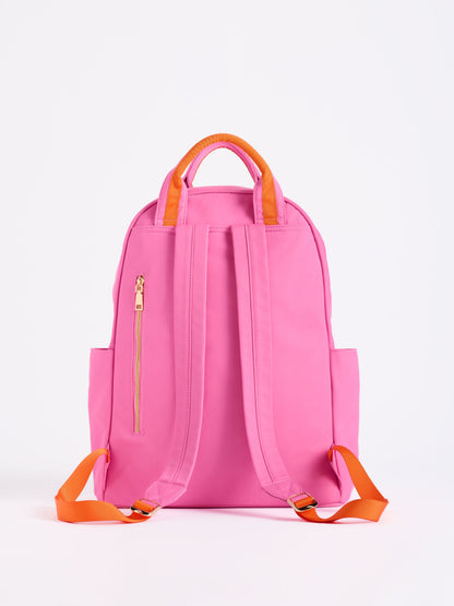 Jet Backpack with Inner Tech Sleeve, A navy backpack with bright green handles and zipper trim, a front zip pocket, side pockets and a green and navy tassel zipper pull.
