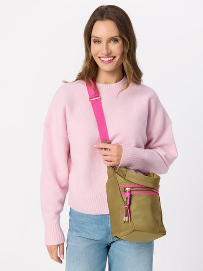 Jet Convertible Cross-Body Bag with Top Handles, shown in a styled setting