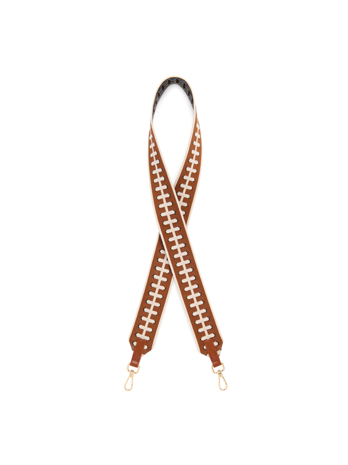 Football Lace Bag Strap, Brown, A wide brown woven strap with a cream football lace pattern, crossed in a loop with gold-tone clasps and brown tabs at both ends.