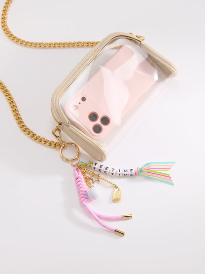 Tee Time Golf Bag Charm and Key Ring, Pink, shown in a styled setting