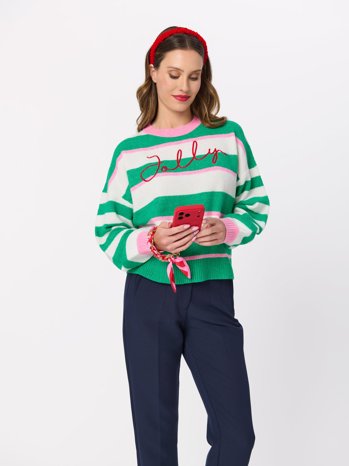 Phone Wristlet with Scarf Bow and Gold-Tone Chain, shown in a styled setting