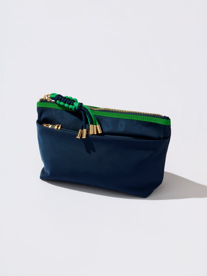 Jet Nylon Zip Pouch with Four Pockets and Paracord Zipper Pulls, shown in a styled setting