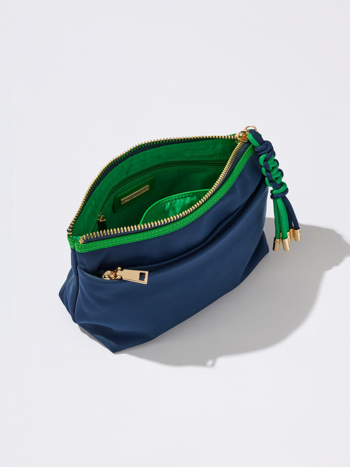 Jet Nylon Zip Pouch with Four Pockets and Paracord Zipper Pulls, shown in a styled setting