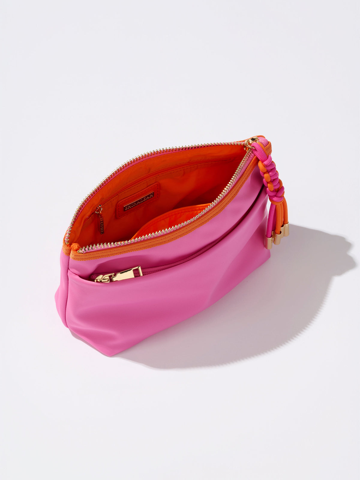 Jet Nylon Zip Pouch with Four Pockets and Paracord Zipper Pulls, shown in a styled setting
