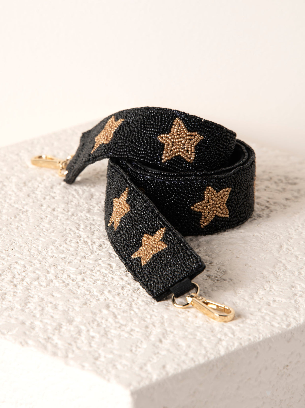 Stars Pattern Beaded Bag Strap, Black, shown in a styled setting