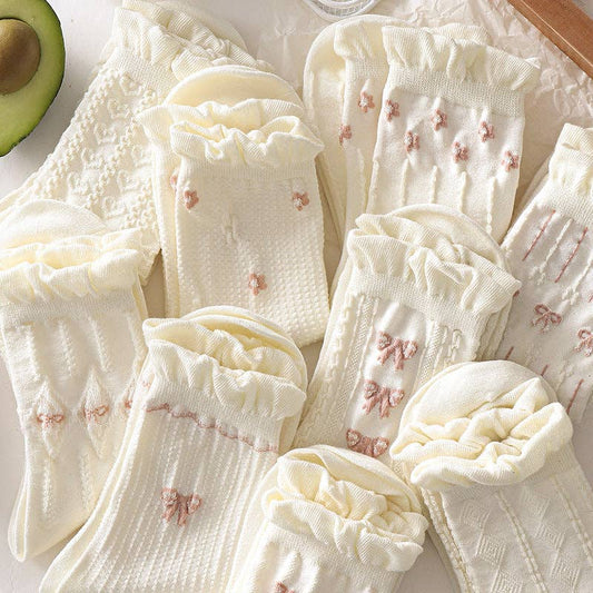 Calcetines blancos con borde enrollado para mujer