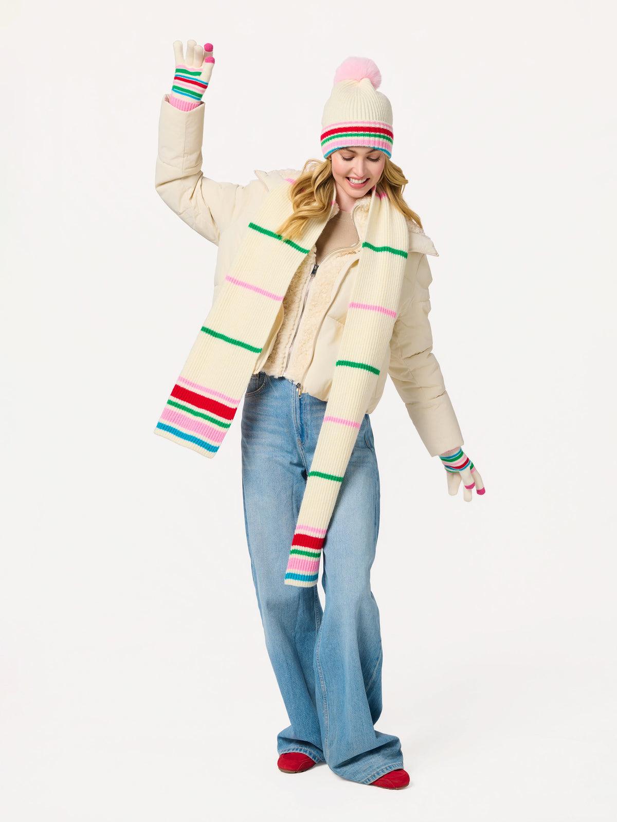 Elle Touchscreen Gloves, Ivory, A pair of cream knit gloves with red, green, blue and pink stripes, deep pink ribbed cuffs and pink fingertips, laid flat on white.