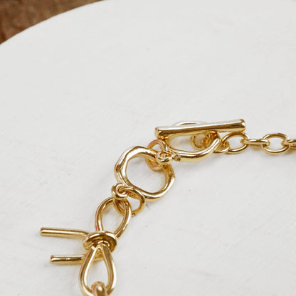 PennyLine inc - Bow Link Bracelet Gold Tone
