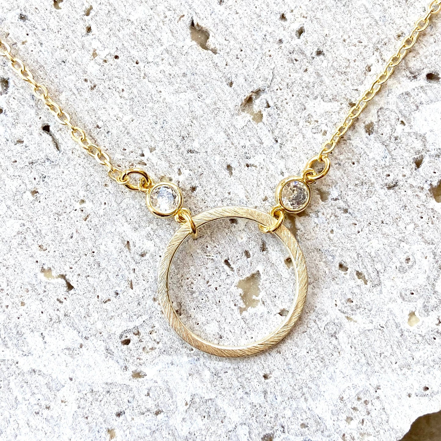 Simple gold circle necklace, boutique, salon