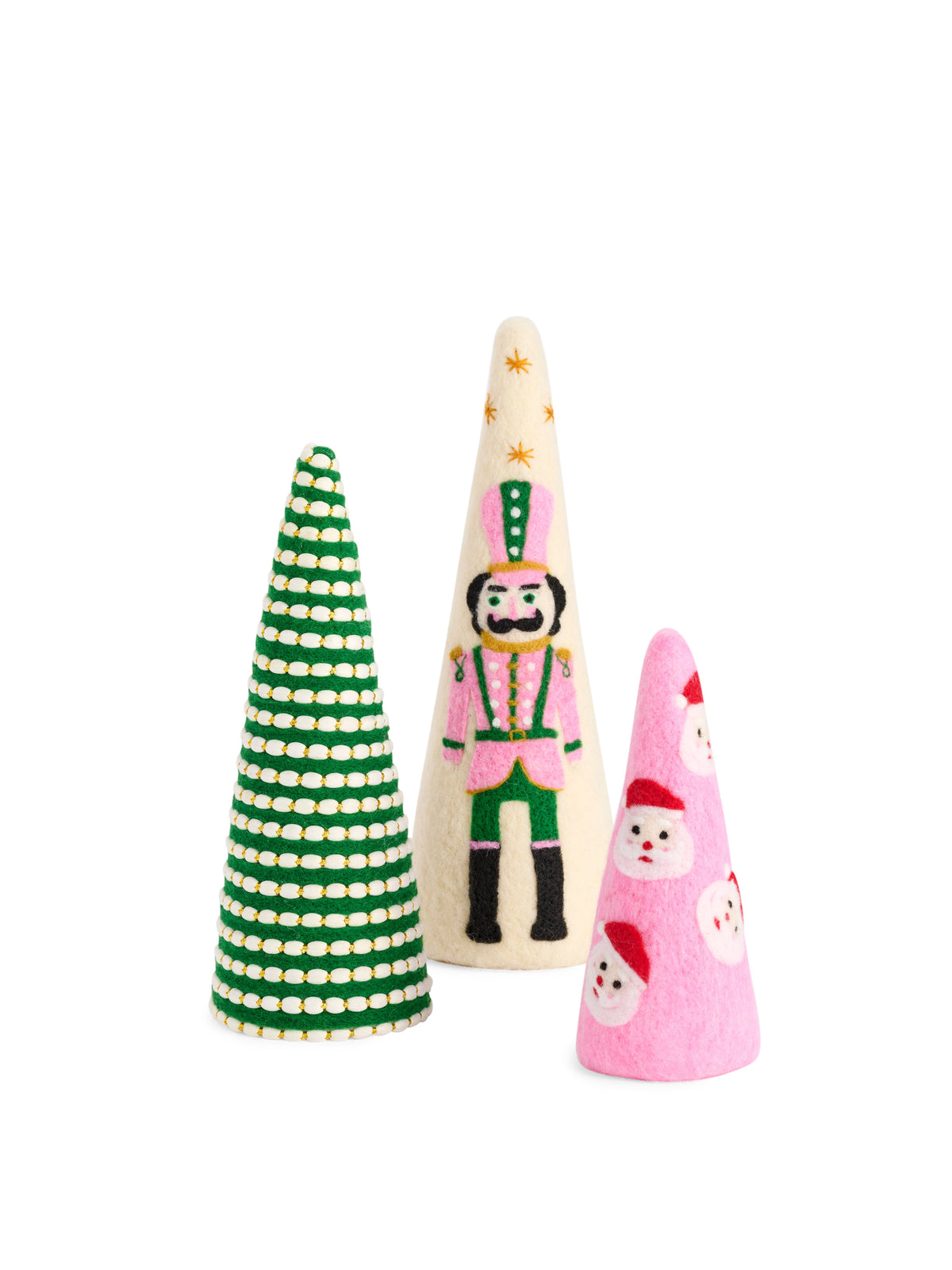 Felt Decorative Christmas Tree, Three felt cone trees on white: a green tree striped with cream beading, a cream tree with a pink and green nutcracker, and a pink tree with Santa faces.