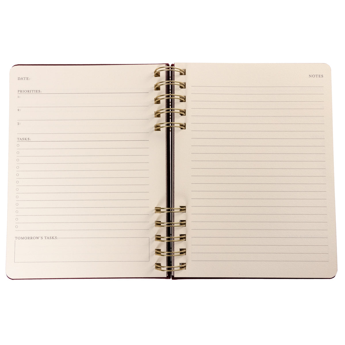 Burgundy Fabric-Bound Task Journal, A burgundy fabric-covered task journal with gold twin wire spirals and two maroon ribbon bookmark tabs, closed with an elastic band.