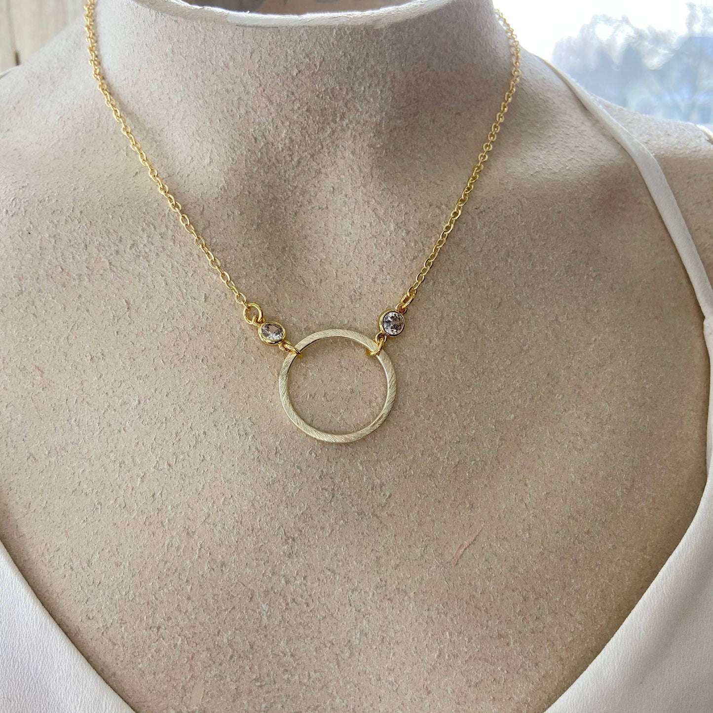 Simple gold circle necklace, boutique, salon