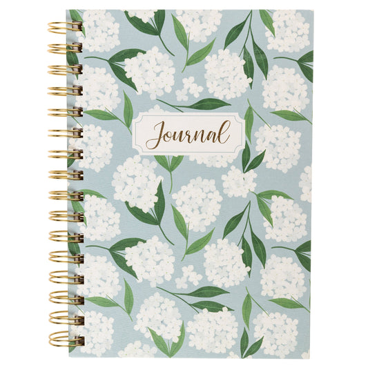 Hydrangeas Everyday Journal, A dusty blue spiral-bound journal covered in white hydrangea blooms and green leaves with a gold foil Journal label near the top.