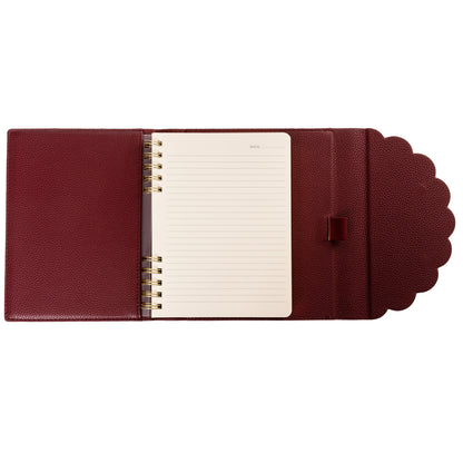 Burgundy Vegan Leather Wrap Journal, A burgundy vegan leather wrap journal with a scalloped flap and pebbled texture, shown open with its spiral insert and pen loop.
