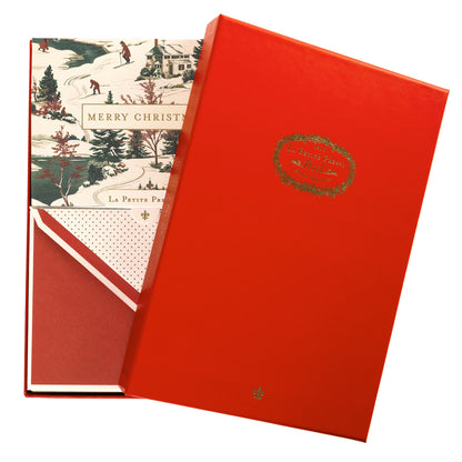 La Petite Noel Scene Holiday Boxed Correspondence Notes, A boxed Christmas correspondence card with a vintage winter village toile scene and Merry Christmas in a gold foil box.