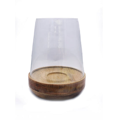 Grove Glass Hurricane Candle Holder, A clear glass dome candle holder on a round natural wood base, shown lit with a pillar candle inside.