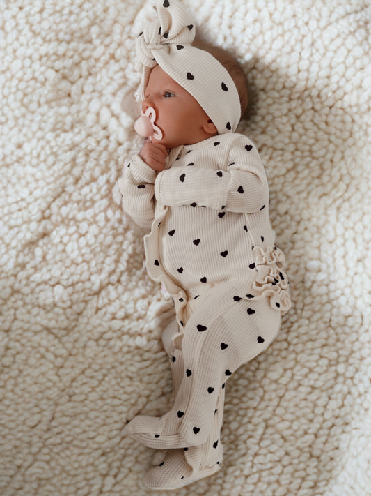 Organic Waffle 2-Way Zip Ruffle Footie, Black Heart: 3 - 6 mo.
