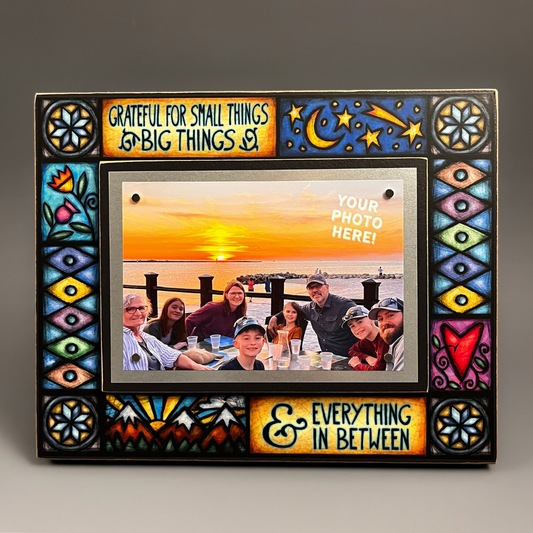 Agradecido por el marco de fotos.